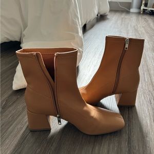 camel colored zip up boot heels